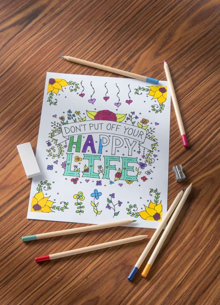 Grab your Dawn Nicole designed free coloring page here - I love the saying "don't put off your happy life." So pretty! Use pencils or markers to color.