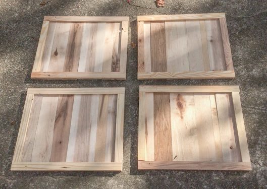 Trim pieces around the pallet panels