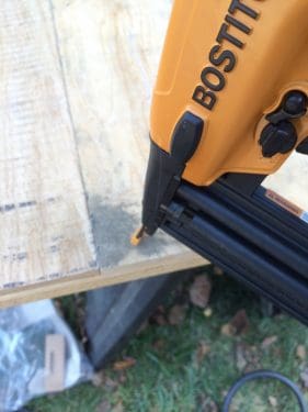 Bostitch nail gun nailing into the panel