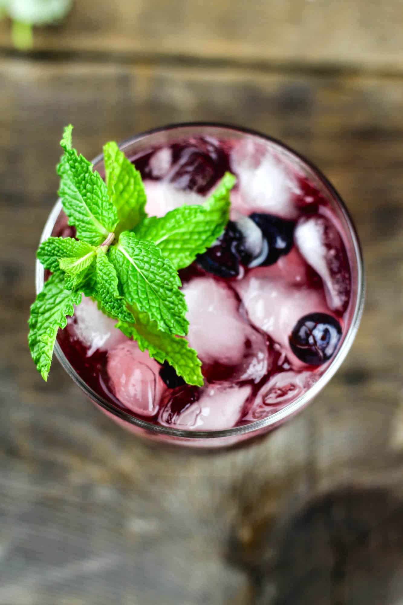 Easy mint, blueberry, and cherry vodka sour recipe