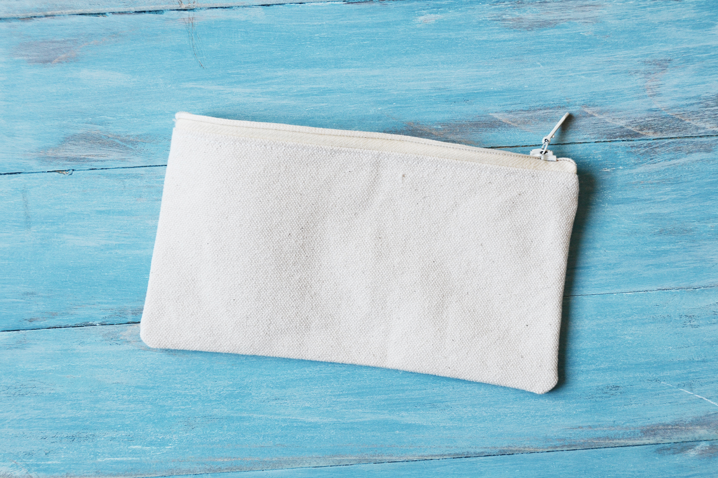 blank pouch on blue rustic background