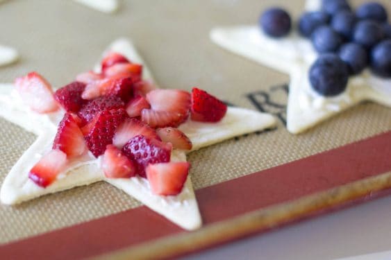 Strawberries and blueberries on the top of the puff pastry