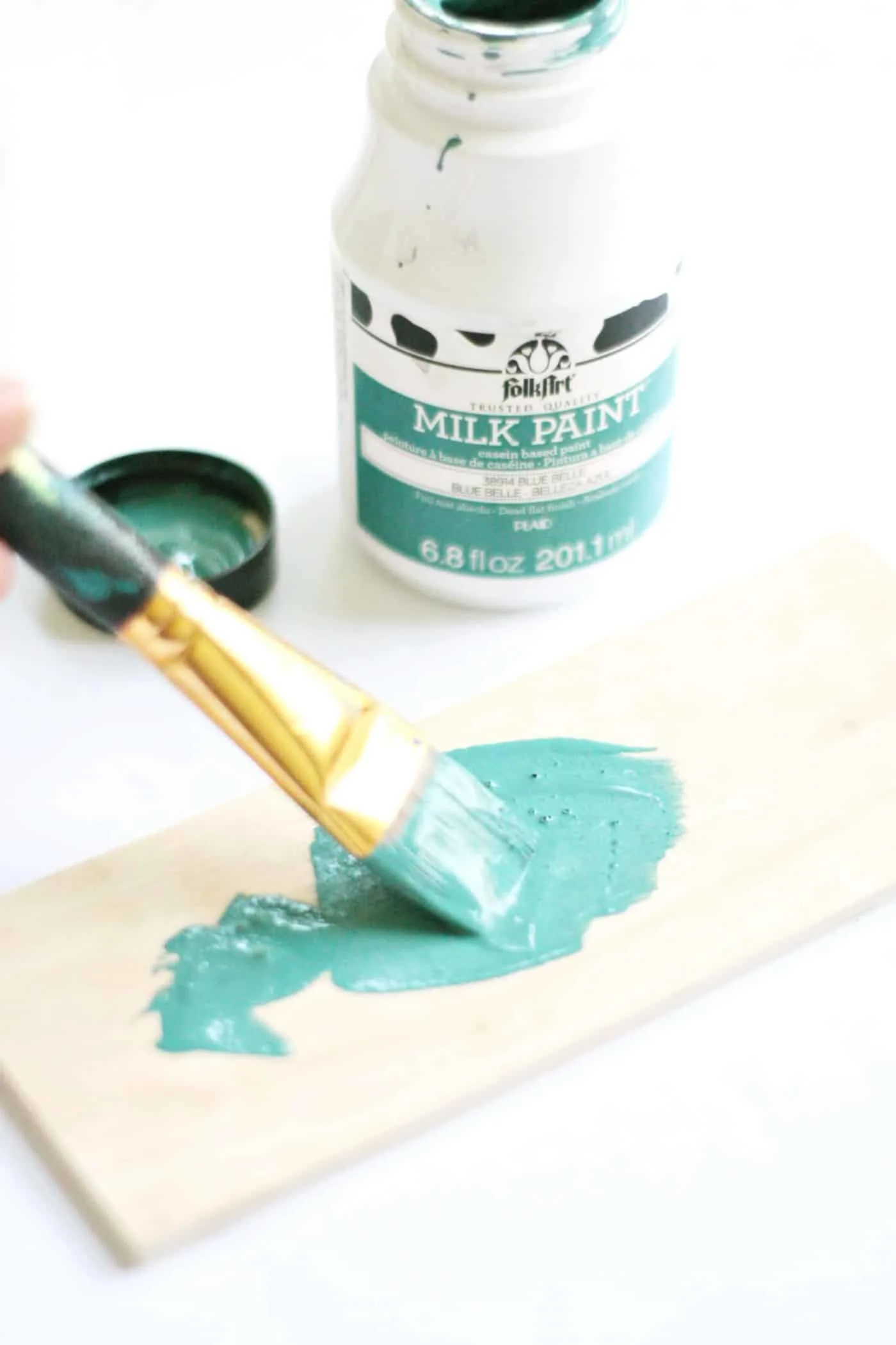Painting the wood with milk paint