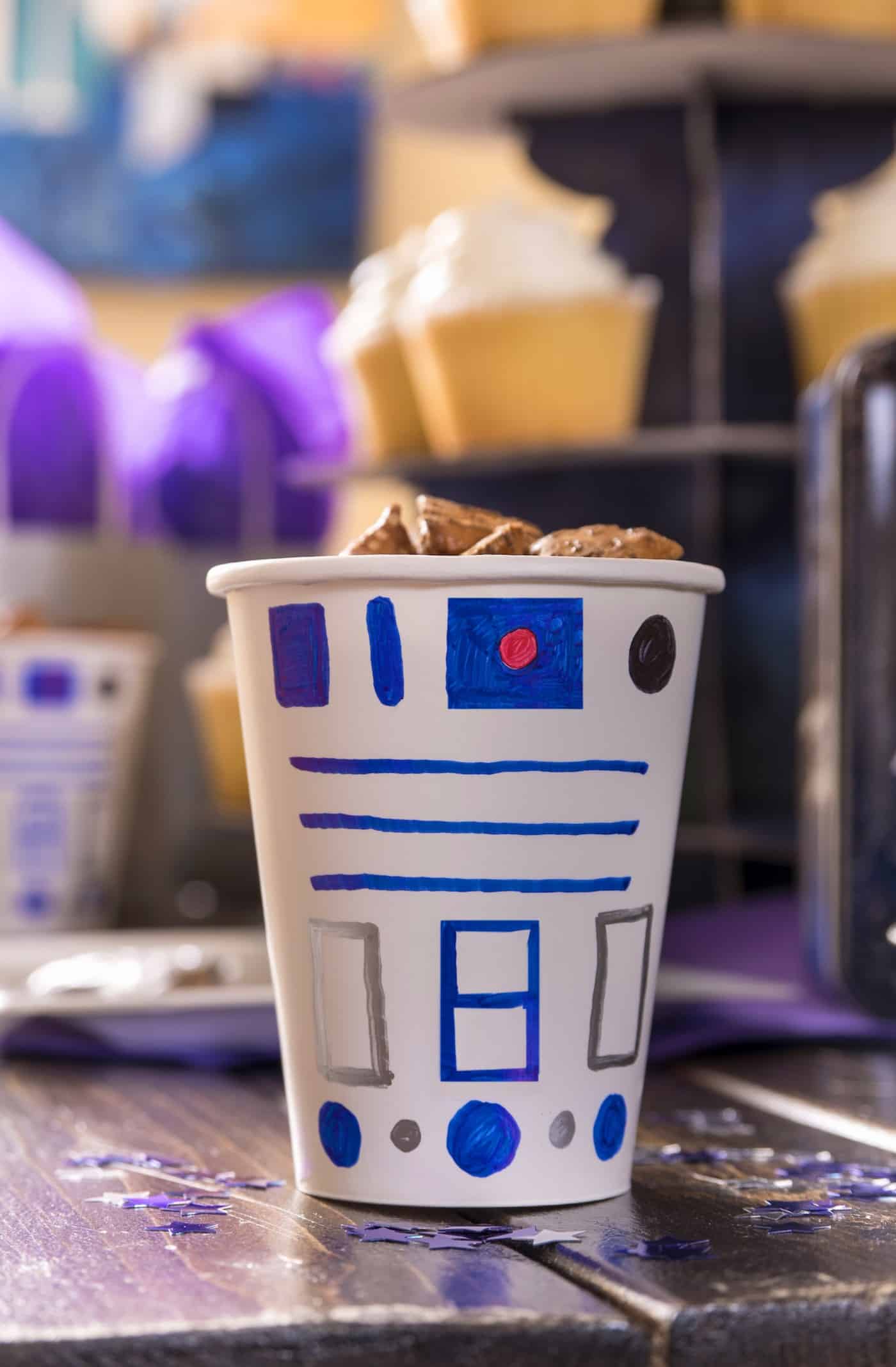 Learn how to have a Star Wars birthday party without blowing your kid's college fund! Here are my favorite tips and ideas including an R2-D2 DIY cup.