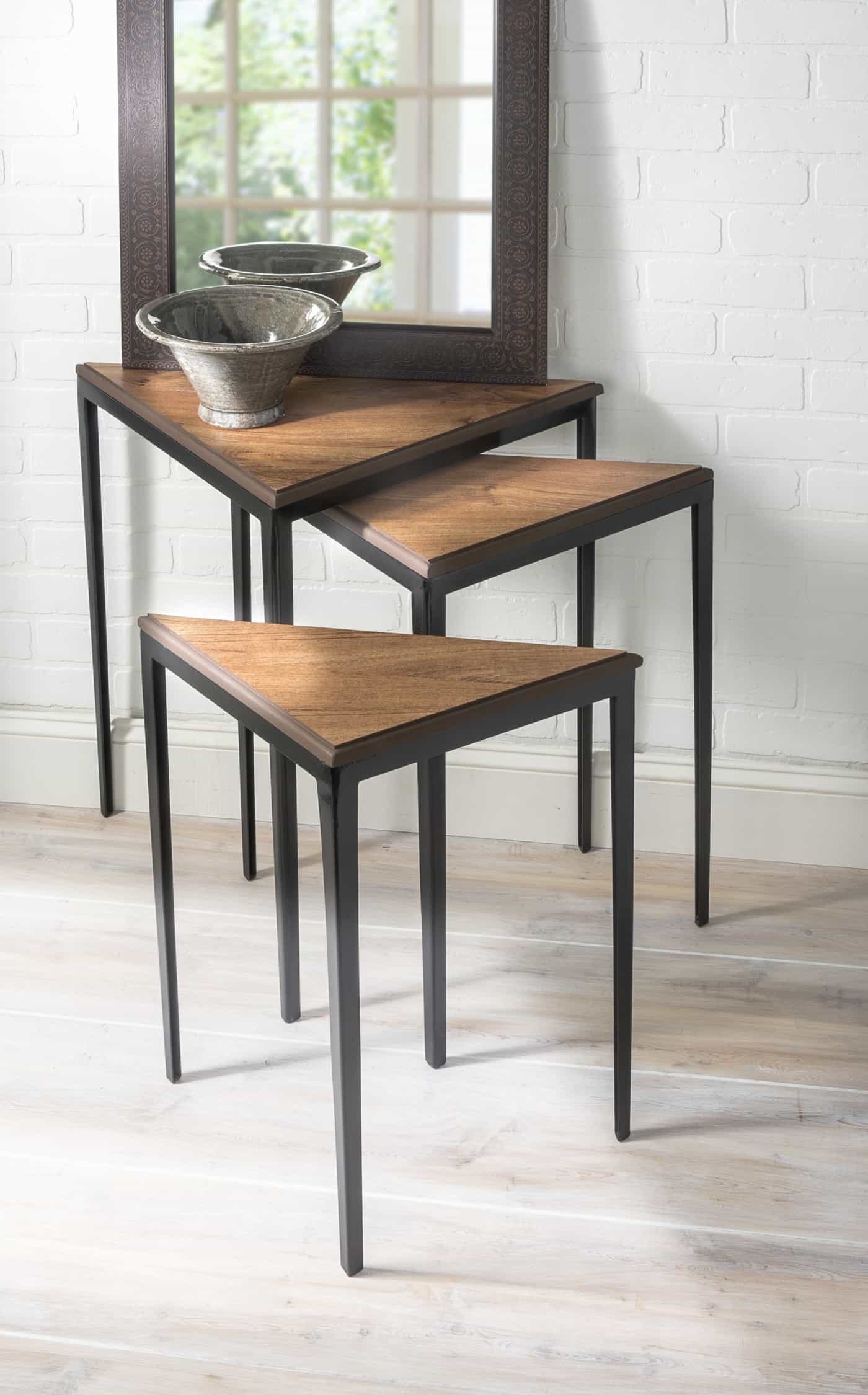 Learn how to revamp nesting tables using vinyl flooring! Leftover flooring makes a perfectly resilient and cost effective tabletop. We love the results!
