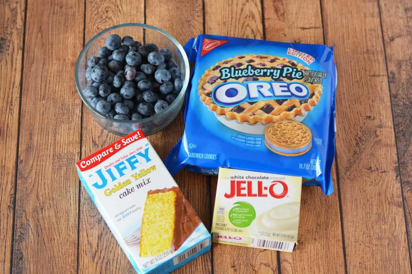 Jiffy Golden Yellow cake mix, white chocolate instant Jell-O pudding, blueberries, and Oreo cookies