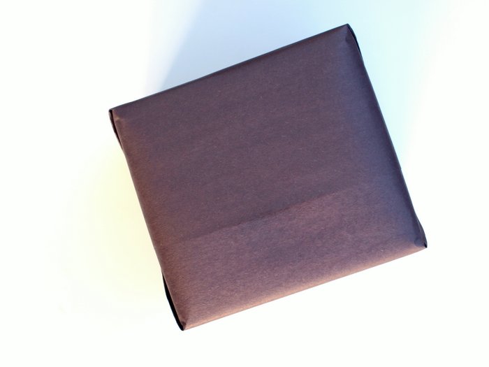Box wrapped with black paper