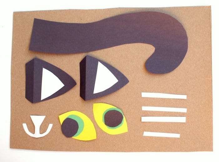 Cat tail, ears, eyes, mouth and whiskers cut out