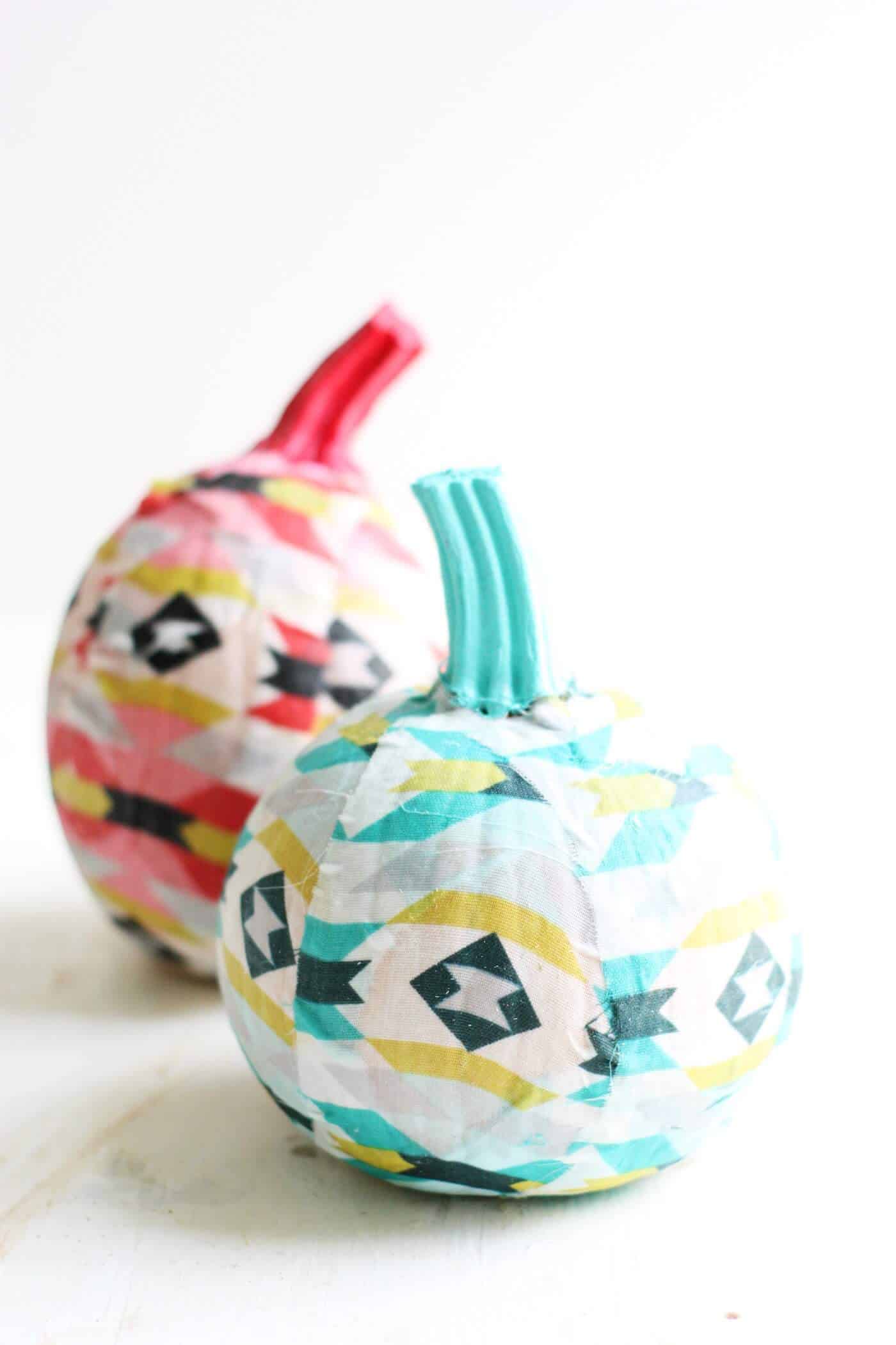 Use a cool and modern fabric to make these unique fabric covered pumpkins! You'll love this easy, no carve idea made with Mod Podge.