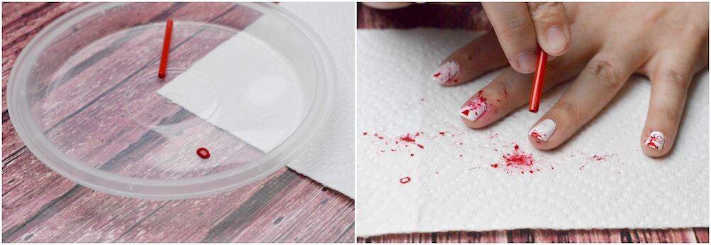 Splattering white nails with red nail polish
