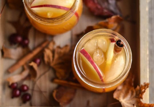 Cider with vodka in mason jar glasses