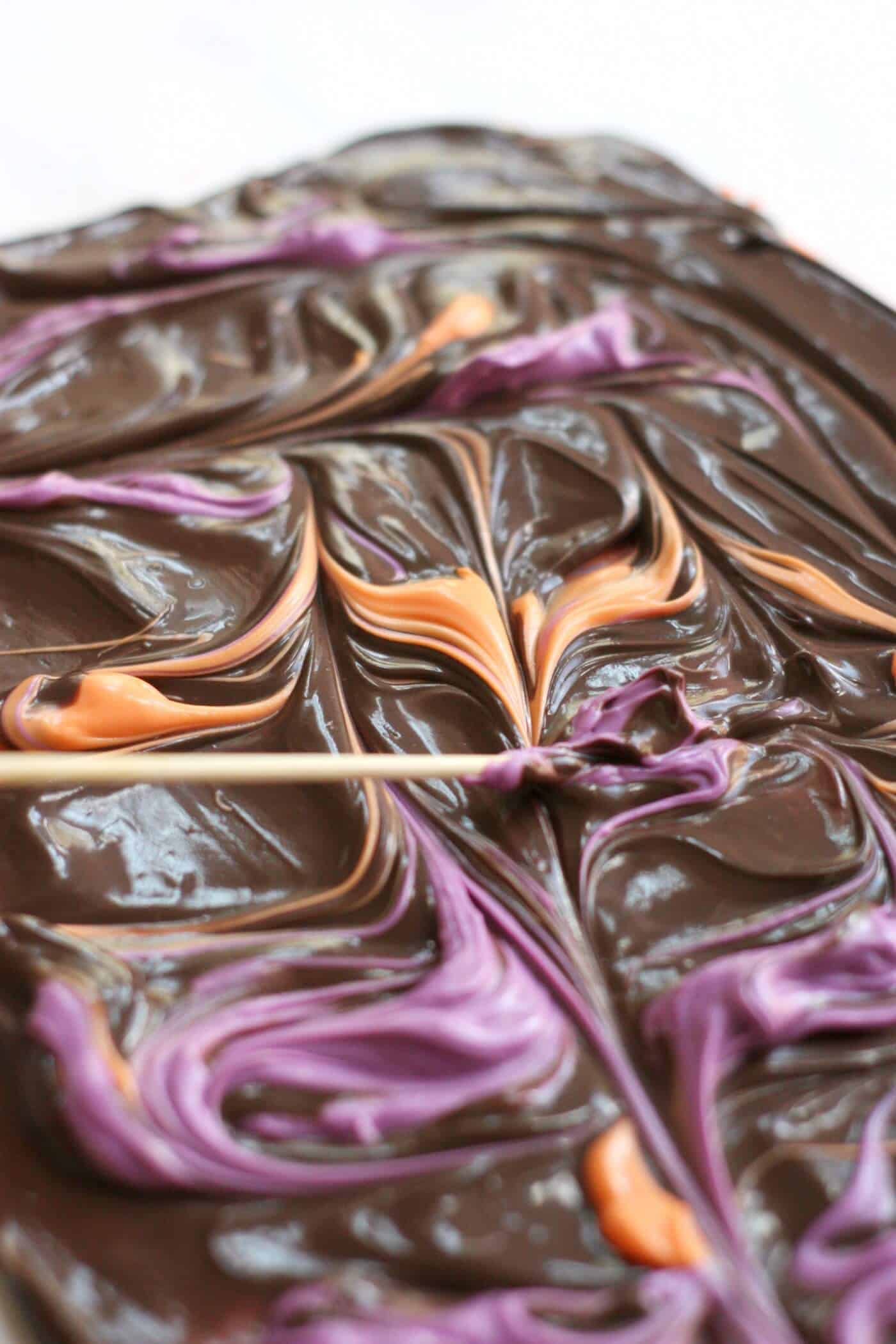 Halloween bark recipe - swirling with a toothpick