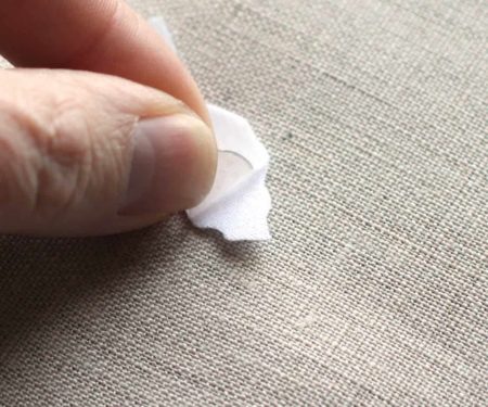 Peeling the paper backing off of the ghost