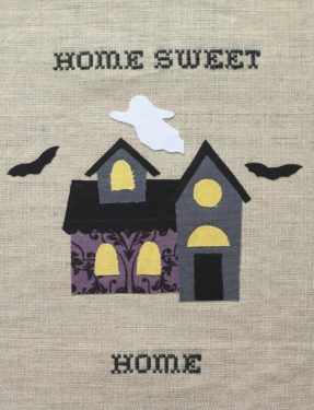 house, bat, and ghosts ironed onto the linen