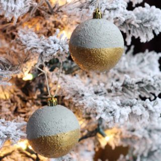 Create modern, unique concrete ornaments without the weight of actual cement! These are so easy to make and look great on your tree.
