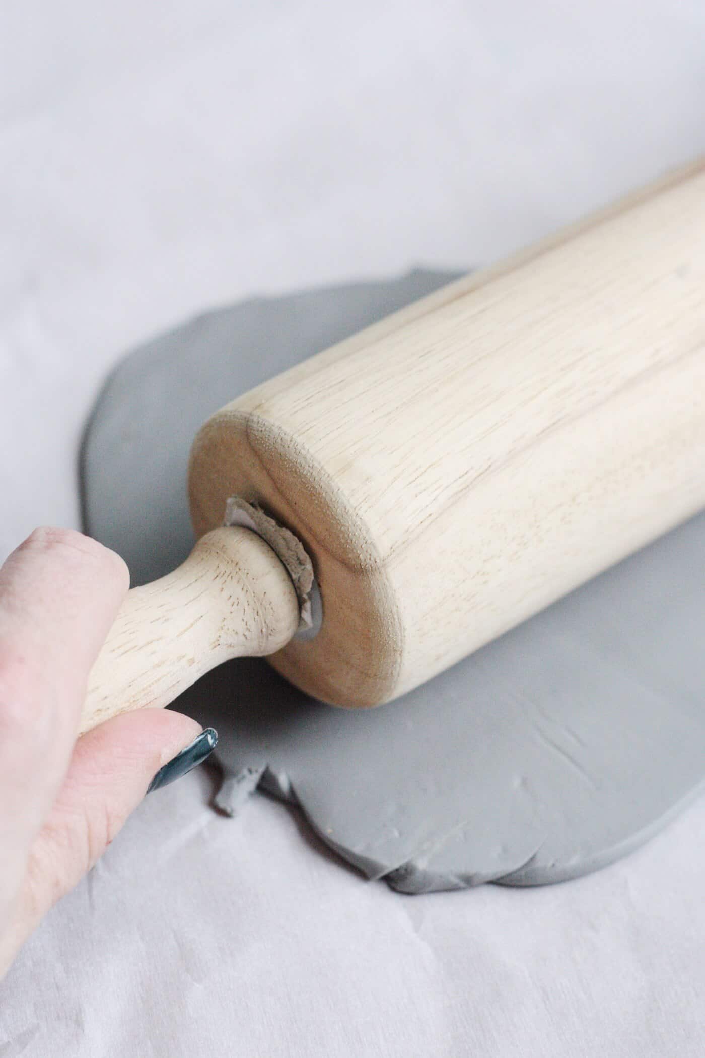 Rolling out polymer clay with a rolling pin