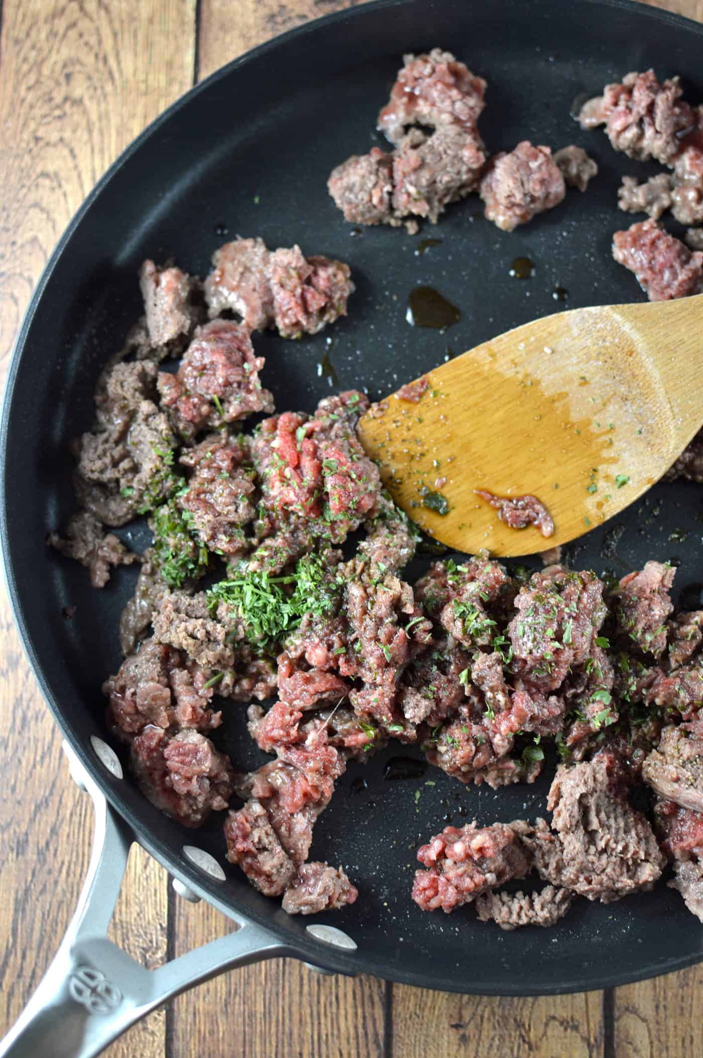 Cooking ground beef and parsley