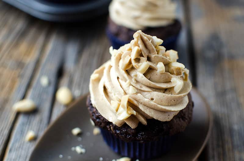 These chocolate zucchini cupcakes are the best you've ever had! They're moist and delicious, and the peanut butter icing pairs perfectly with the flavor.