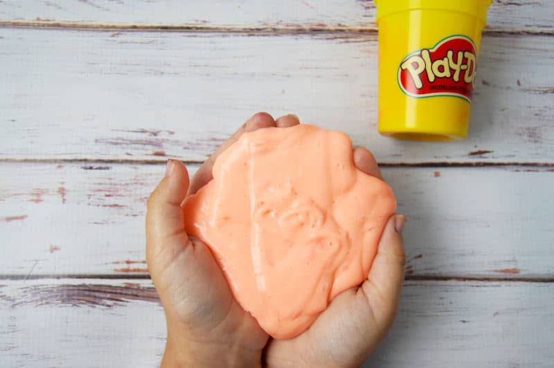 putting play doh in slime