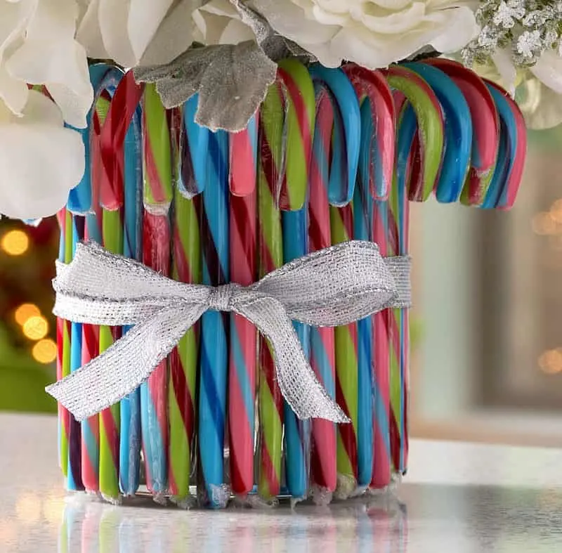 Close up of a candy cane Christmas vase
