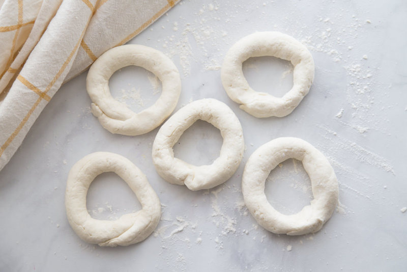 Dough rolled into circle shapes on the counter