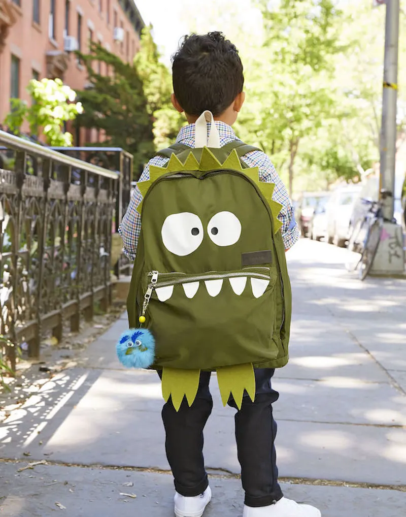 Backpack decorated like a green monster