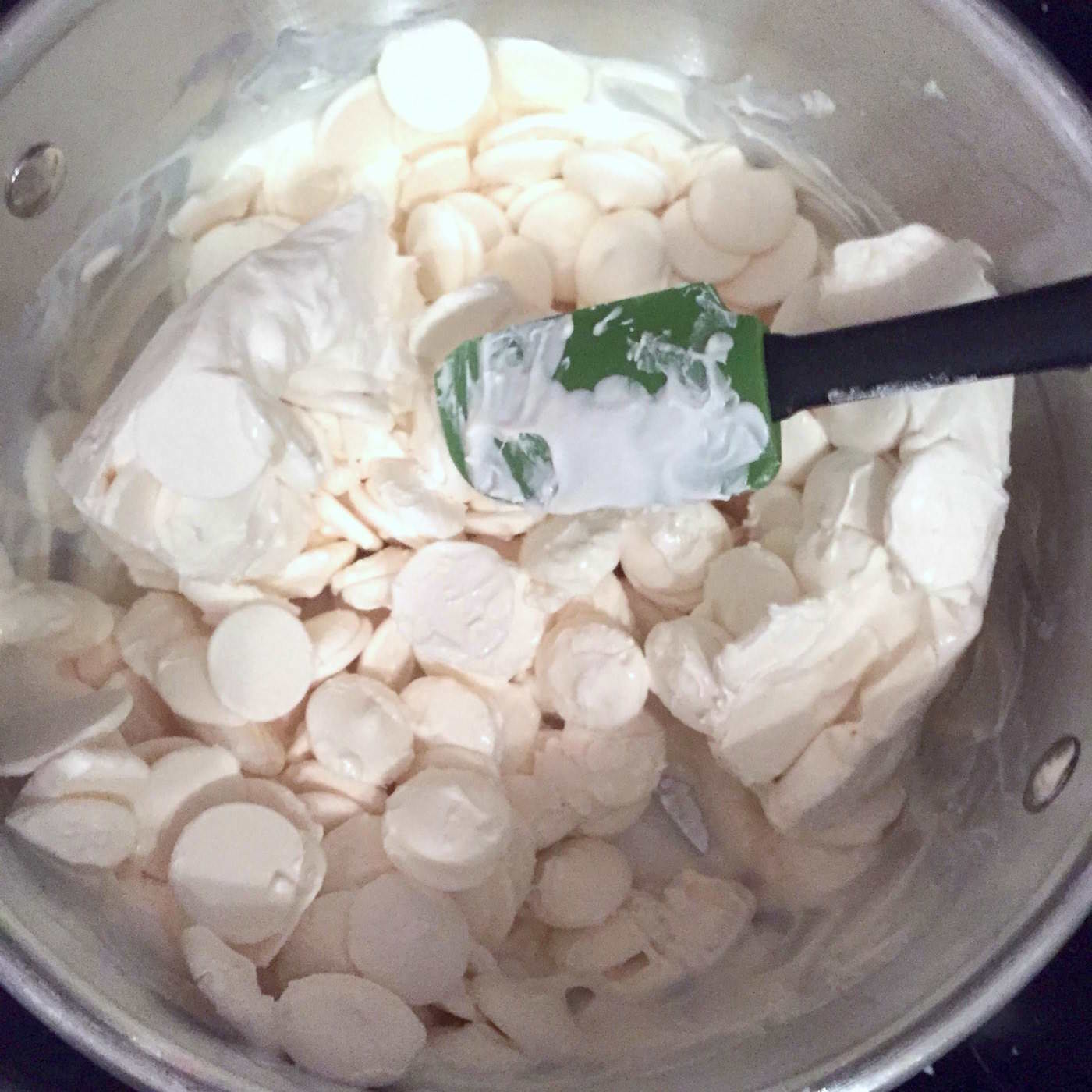 Melting white candy melts in a sauce pan
