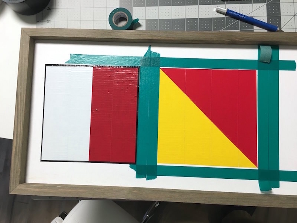 Adding another nautical symbol in tape to the board