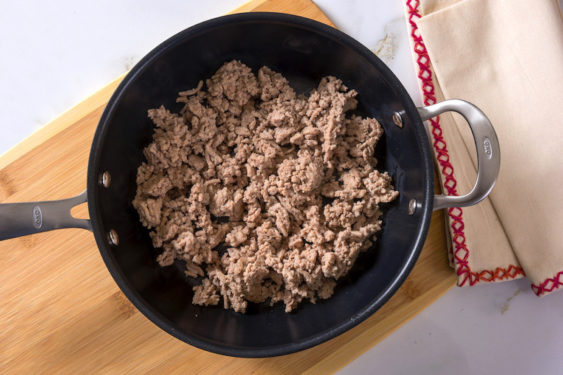 Turkey meat being cooked in a pan