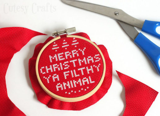 red cloth put into an embroidery hoop and trimmed with scissors