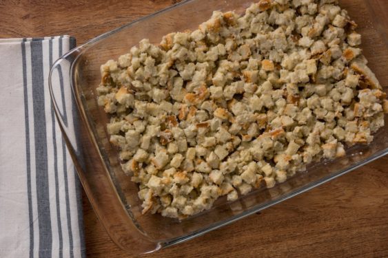 Stuffing spread in the bottom of a casserole dish