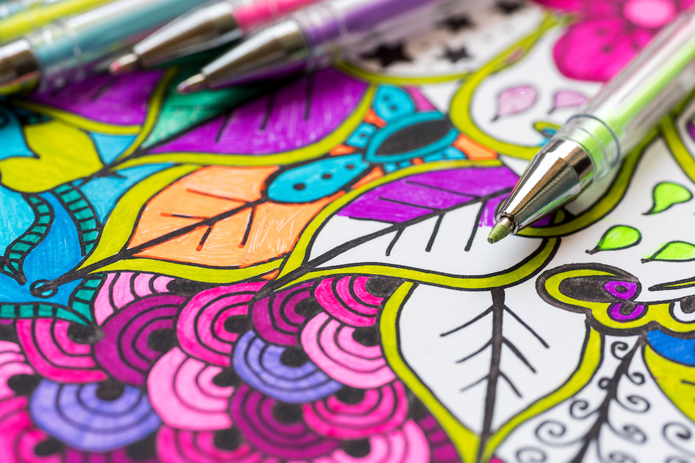 Coloring-page-with-coloring-pens-laying-on-top