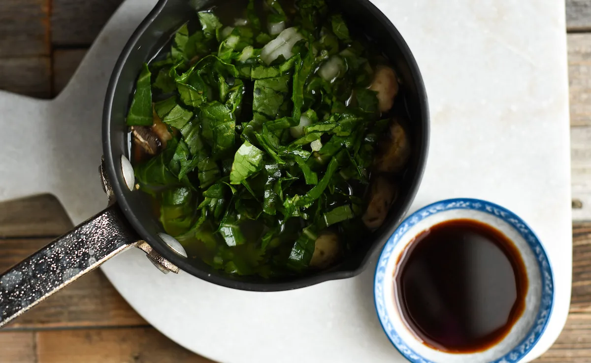 Soy sauce and bok choy on top