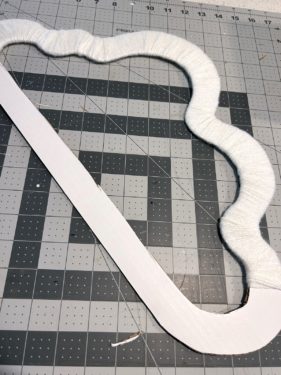 white yarn completely wrapped around the top of the cloud