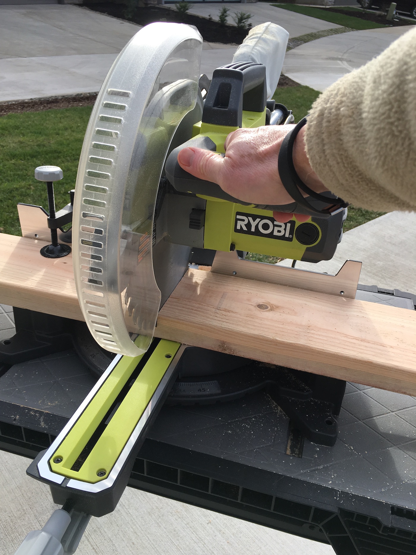 Cutting a wood board with a Ryobi circular saw