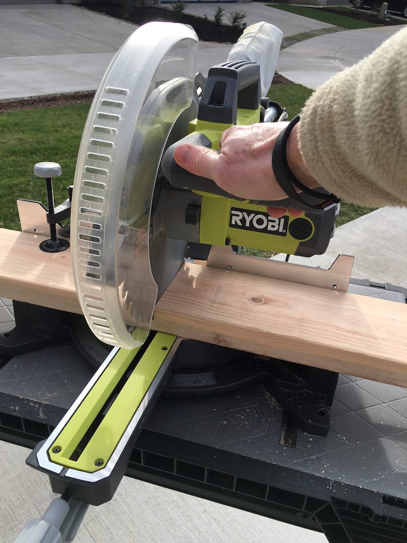 Cutting a wood board with a Ryobi circular saw