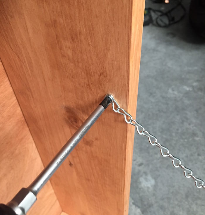 Attaching the chain to the inside of the box