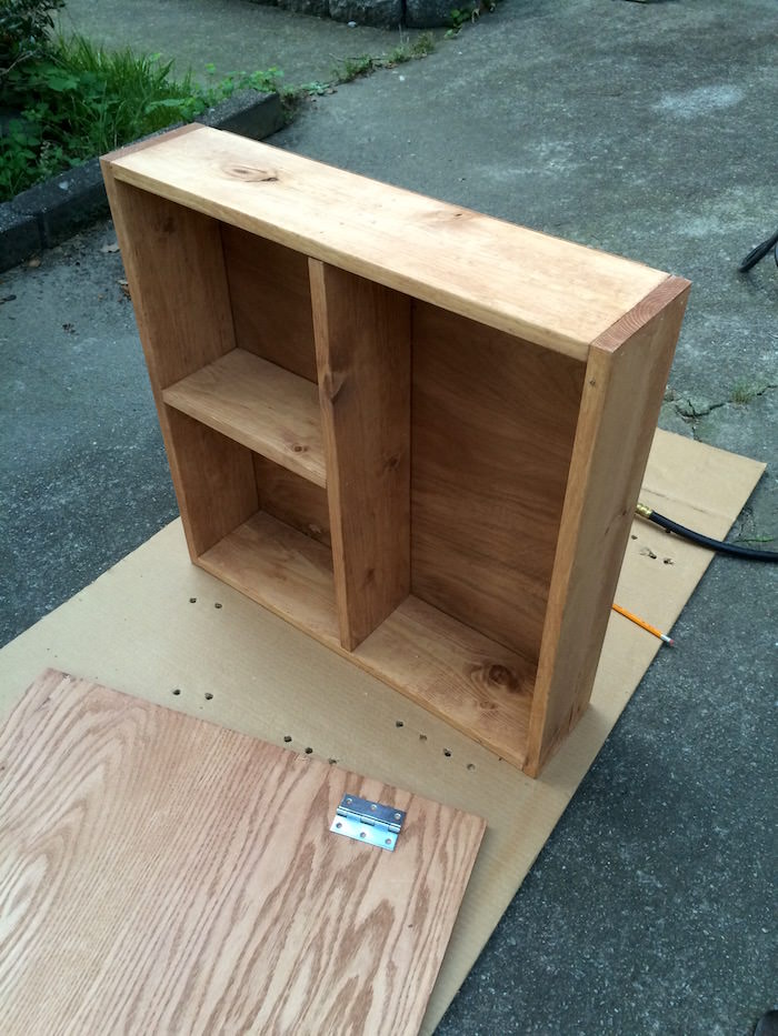 Finished wood shelf with dividers