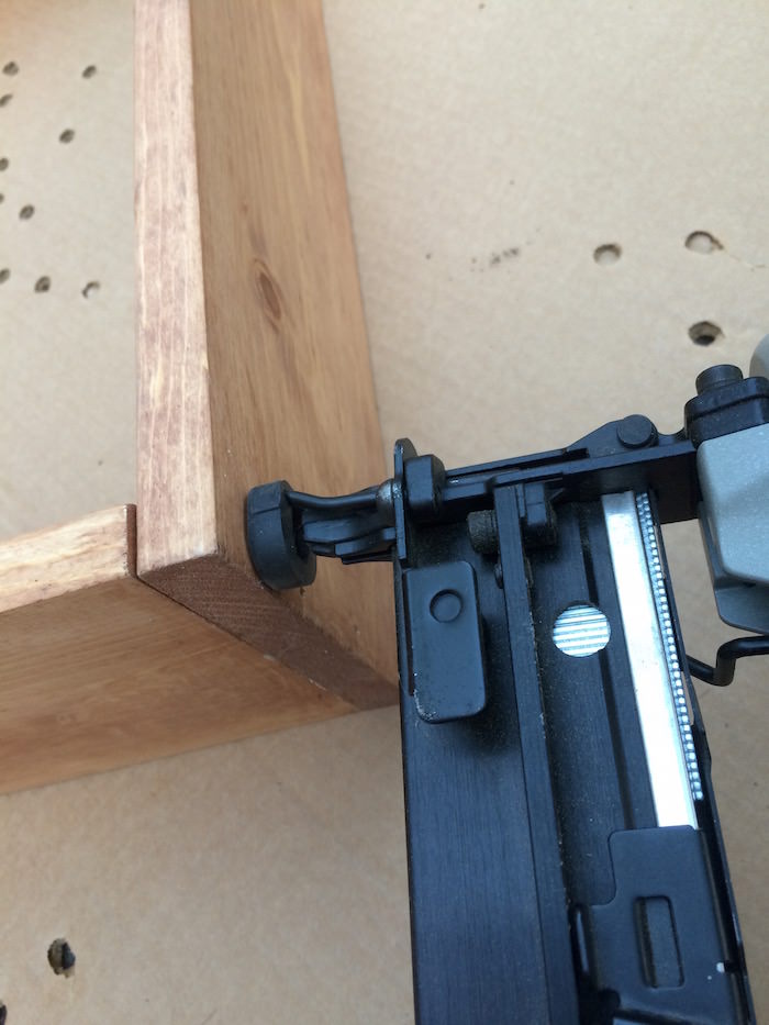 Nail gunning the side of wood box