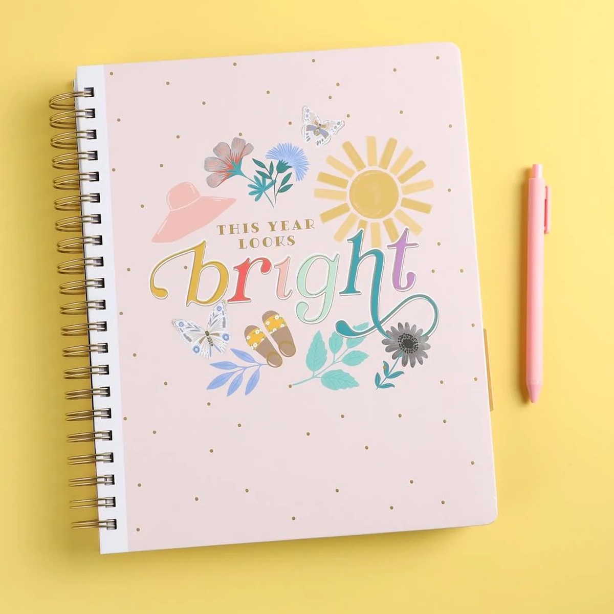 Happy planner on a yellow background