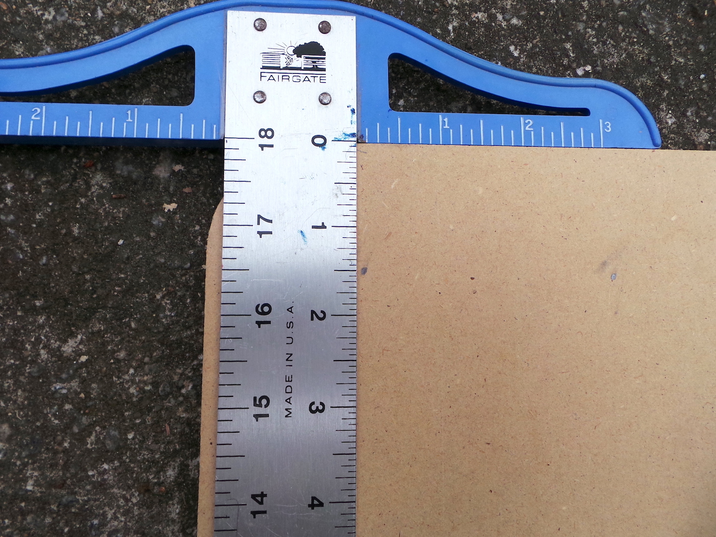 Marking the MDF in one and a half inches from the edge