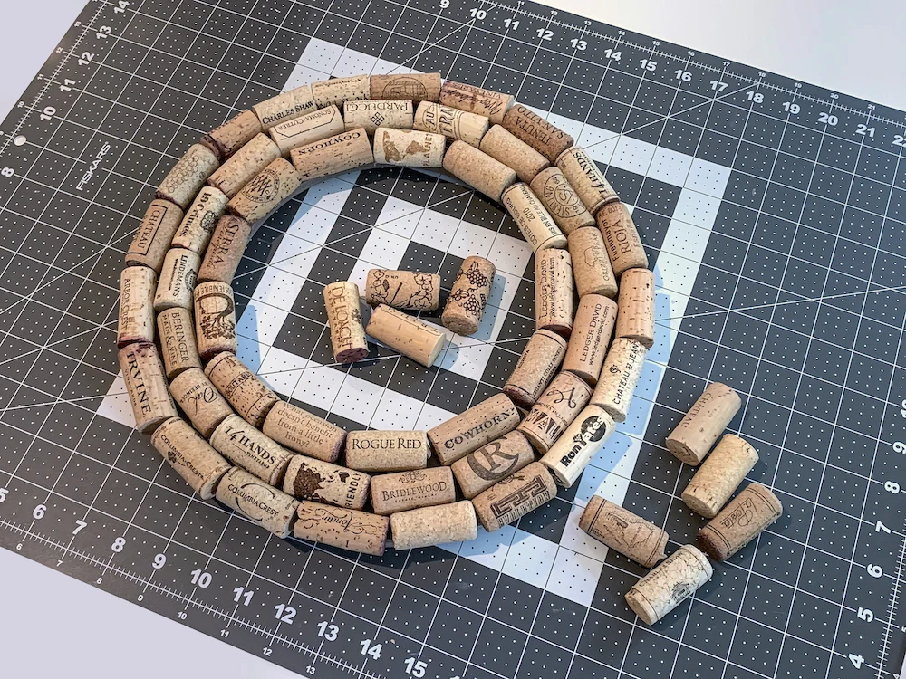 Three-rows-of-corks-on-a-wreath-form