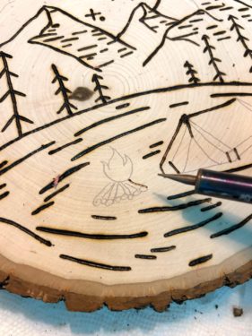 adding details with a thinner wood burning tip