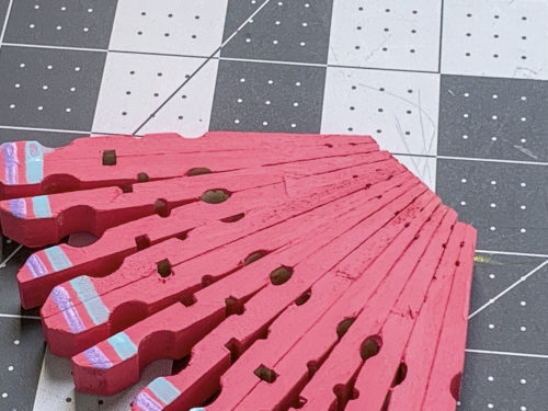 Butterfly wing made out of clothespins and painted pink