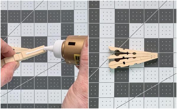 Gluing two clothespins together to form a portion of a butterfly wing