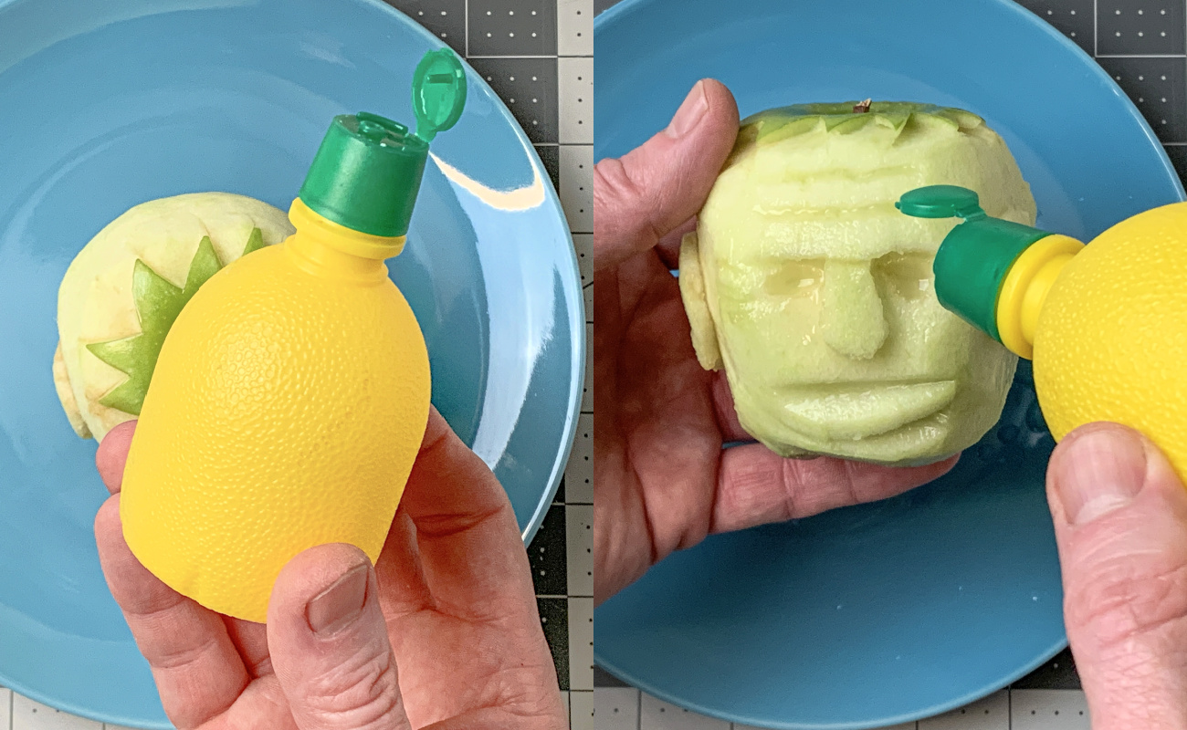 Pouring lemon juice on shrunken apple heads