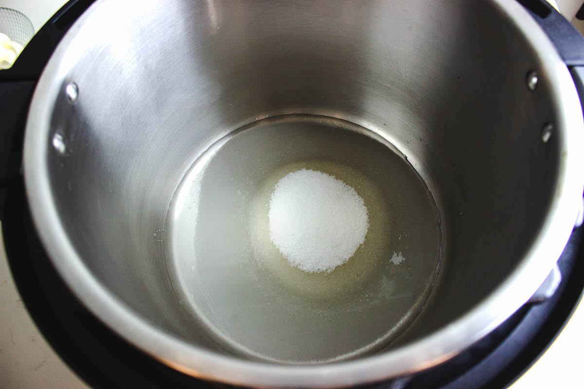 Water and sugar added to an Instant Pot