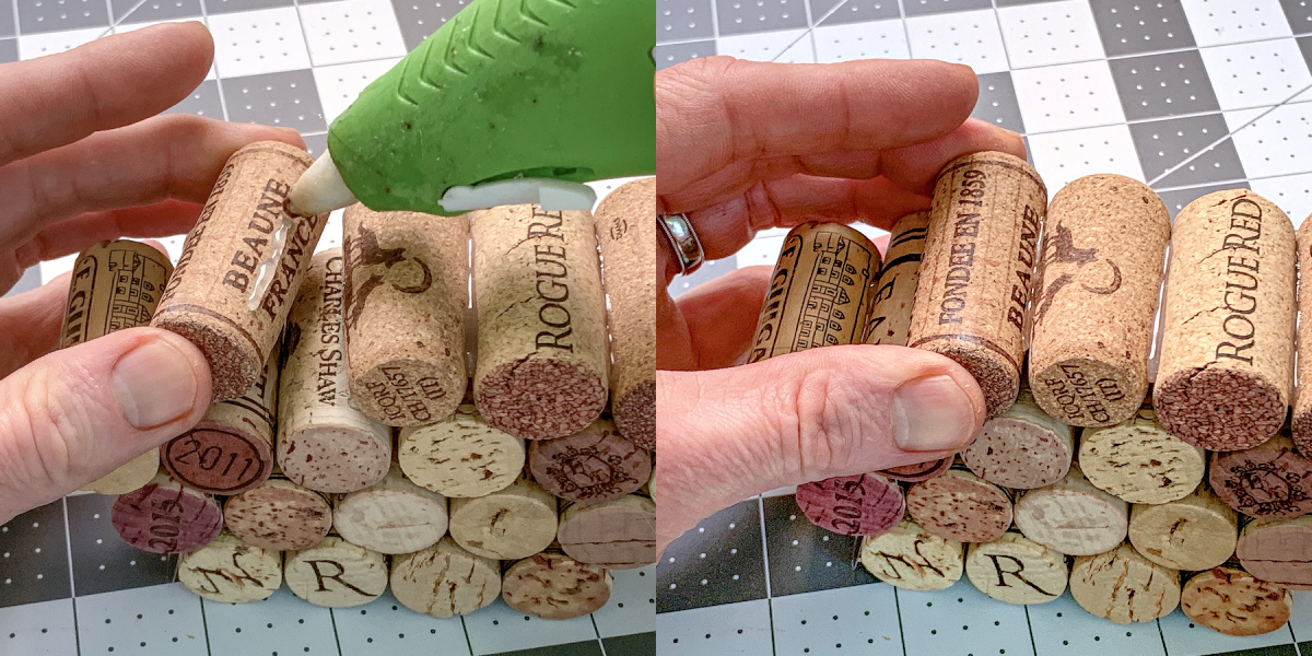 Attaching a wine cork to a stack of wine corks with hot glue