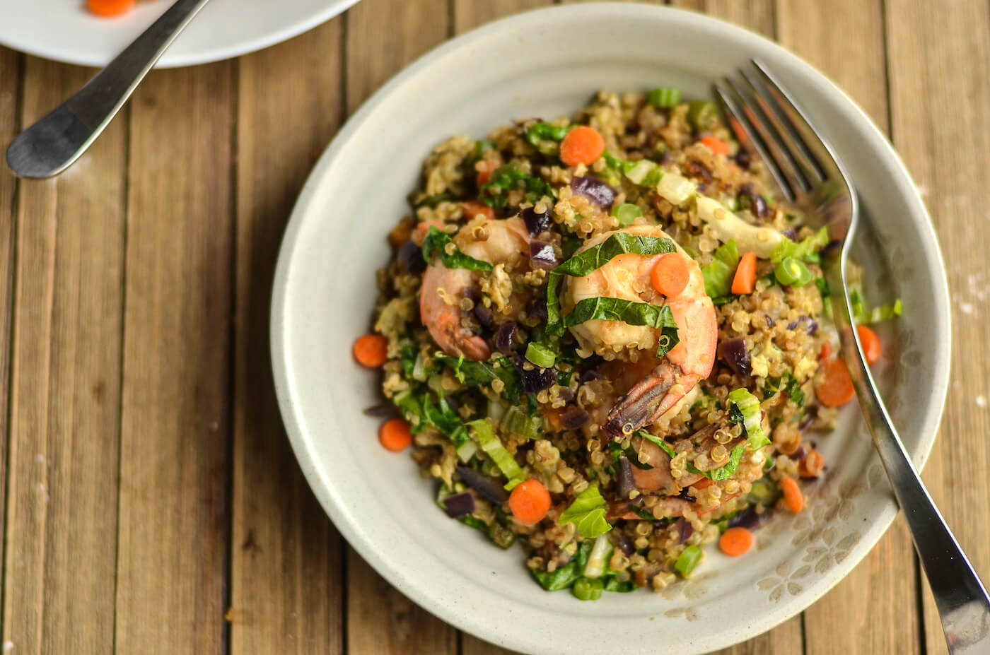 Cooked shrimp and quinoa with veggies