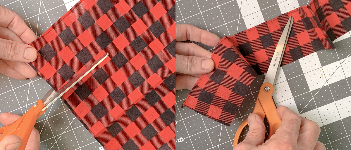 Cutting a strip of buffalo plaid bandana with a pair of scissors